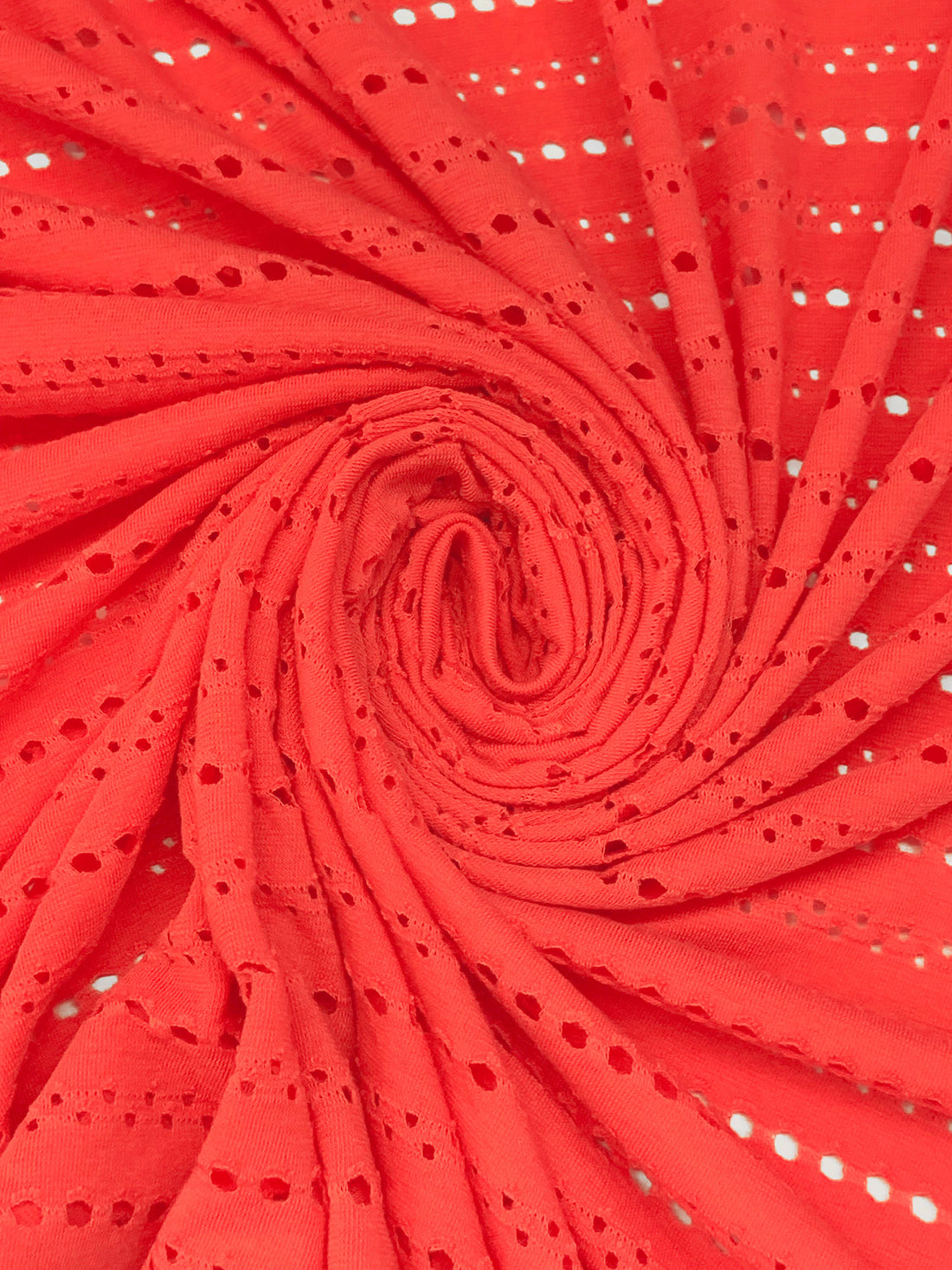 Coral Polyester/Lycra Horizontal Eyelet Knit 55W