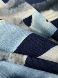 Pewter Blue/Navy Blue/Pale Gray/White Polyester/Lycra Puff Accent On Abstract Wisp Print ITY Knit 58W