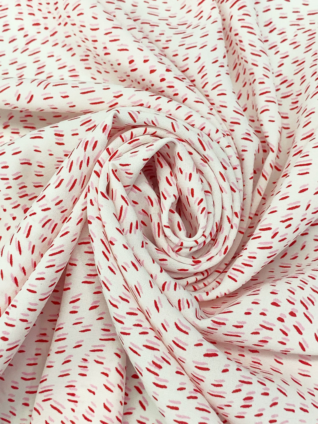 Off-White/Persian Red/Cameo Pink 100% Polyester Wavy Dashes Print Crepe Blouse Weight Woven 55W
