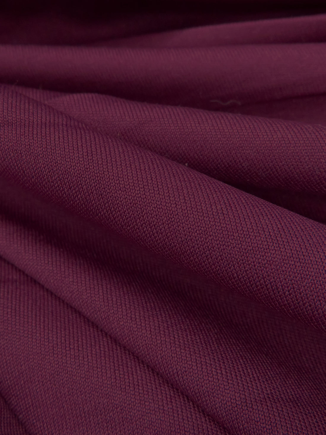 Sangria Purple 100% Polyester Matte Performance Interlock Knit - Corbeaux Clothing - 54W