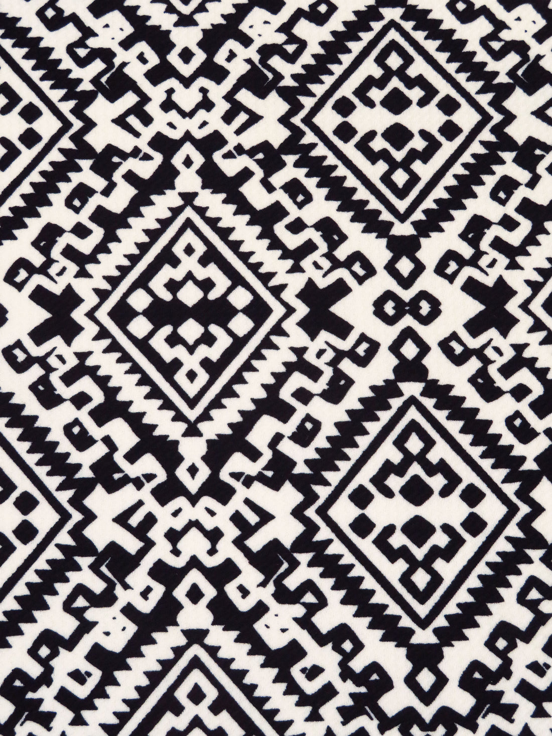 Black/Pearl Polyester/Lycra Tribal Print Liverpool Double Knit 56W