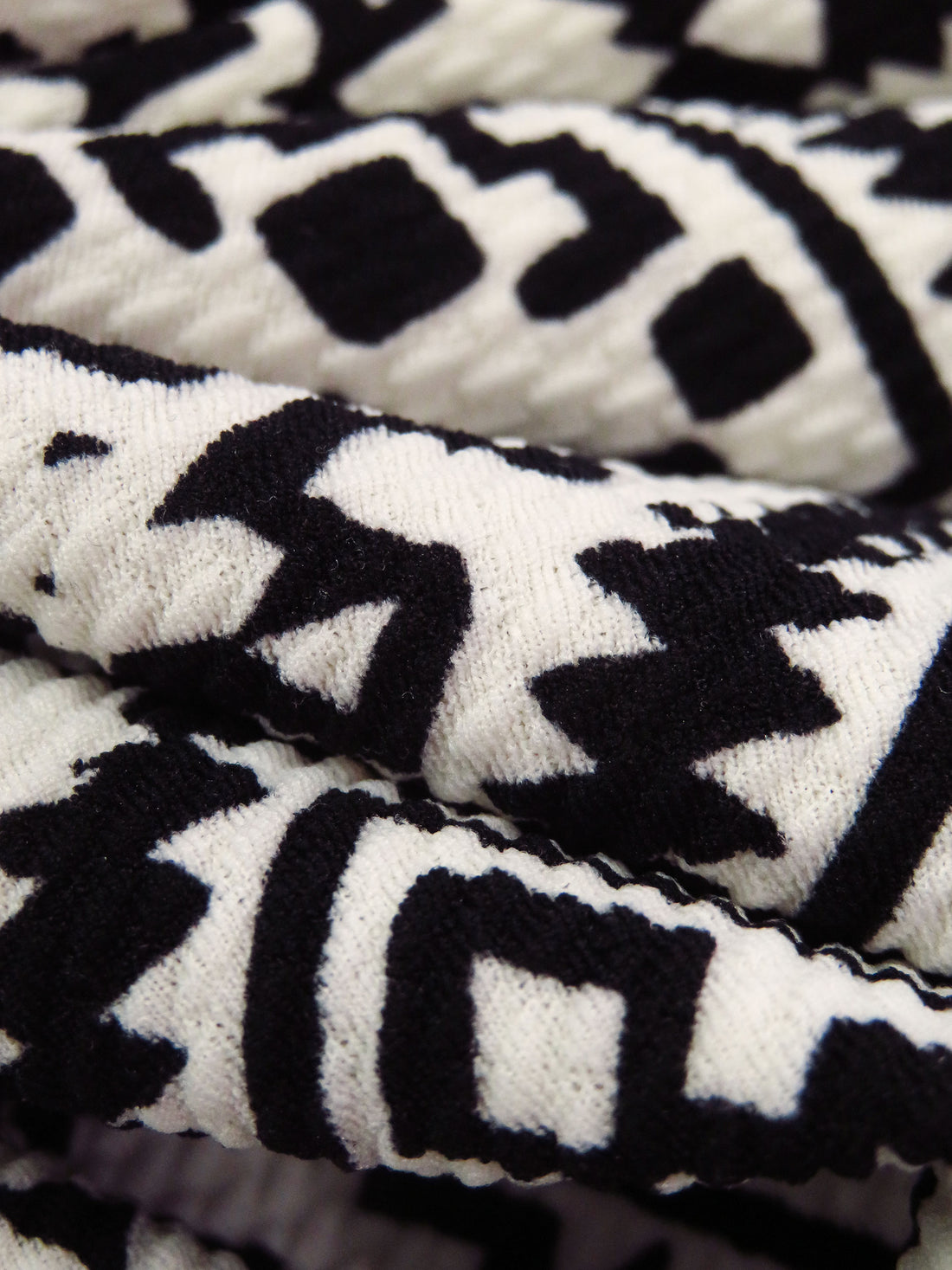 Black/Pearl Polyester/Lycra Tribal Print Liverpool Double Knit 56W