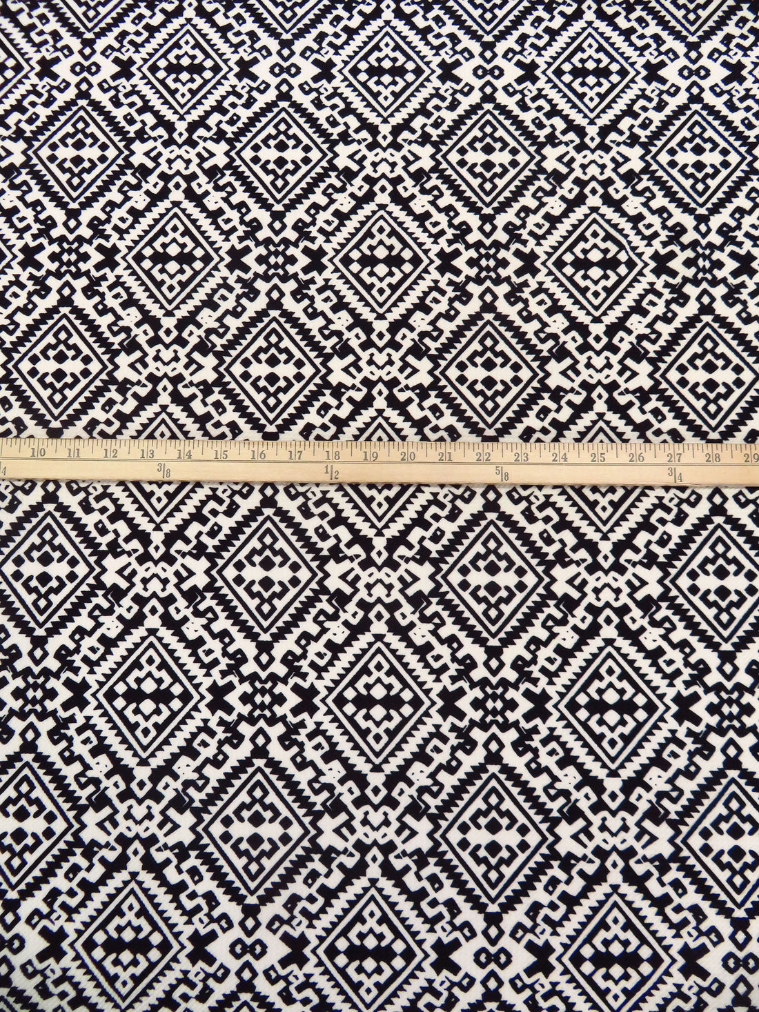 Black/Pearl Polyester/Lycra Tribal Print Liverpool Double Knit 56W