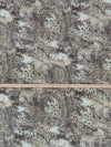 Spearmint/Muted Khaki/Black Polyester/Lycra Meandering Raised Stitch On Animal Print DTY Knit 60W