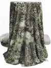 Spearmint/Muted Khaki/Black Polyester/Lycra Meandering Raised Stitch On Animal Print DTY Knit 60W