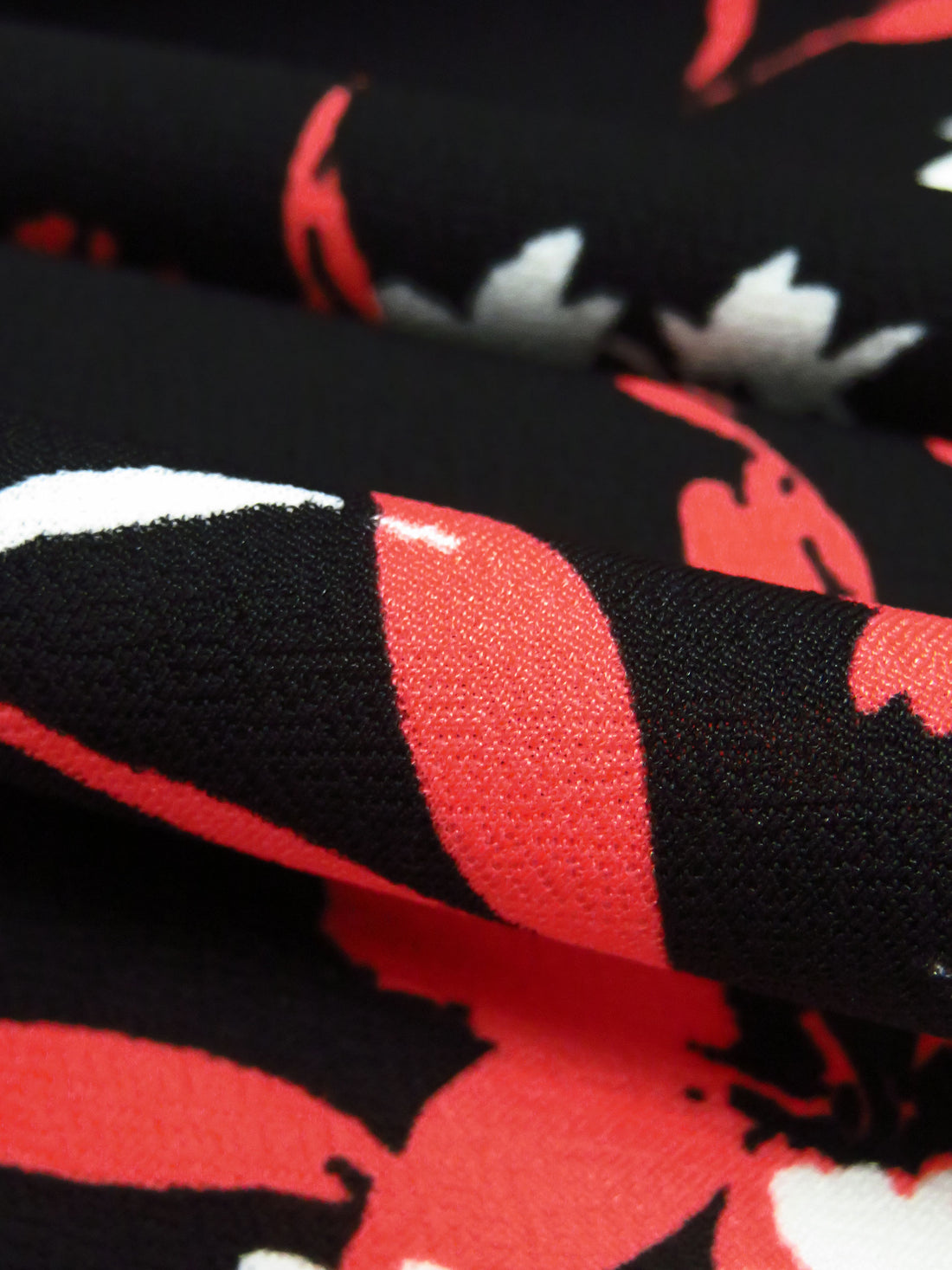 Tart Orange/Black/White Polyester/Lycra Floral Print Crepe Double Knit 56W