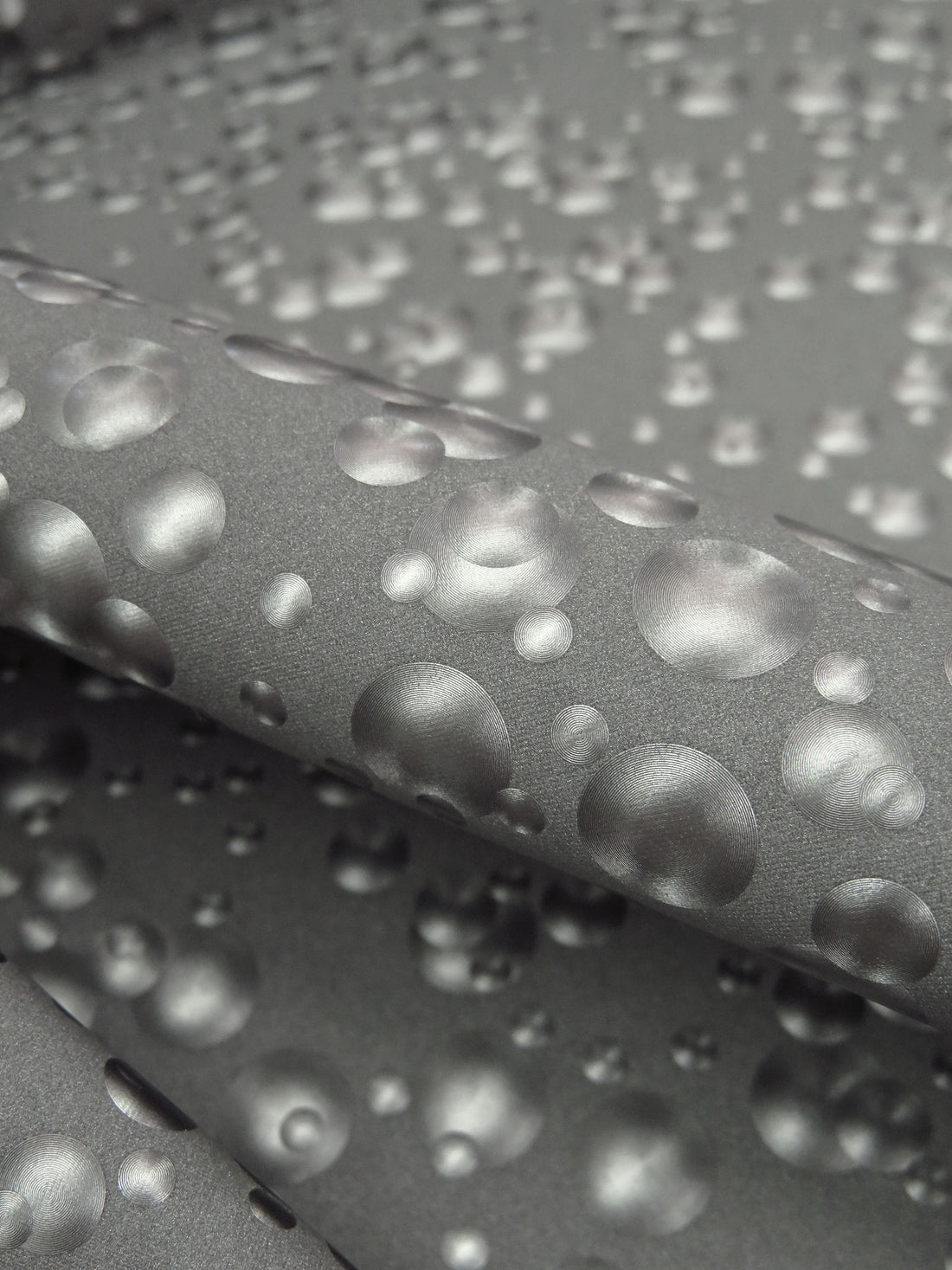 Spanish Gray/Silver 100% Polyester Fused Hologram Bubbles Vinyl Poplin - Norma Kamali - 59W