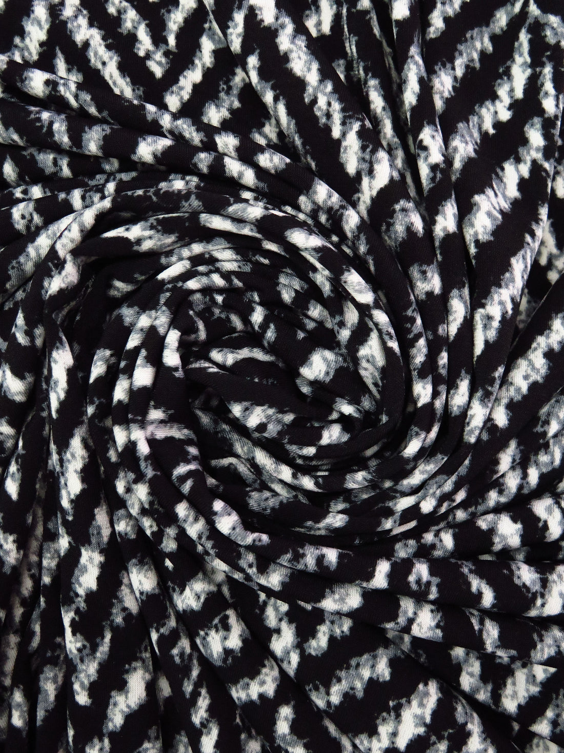 Black/Trolley Gray/White Polyester/Lycra Distressed Herringbone Print ITY Knit - Norma Kamali - 58W