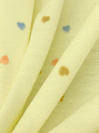 Buttercream/Muted Cerulean/Hot Coral Polyester/Lycra Mini Hearts Print French Terry Knit 60W