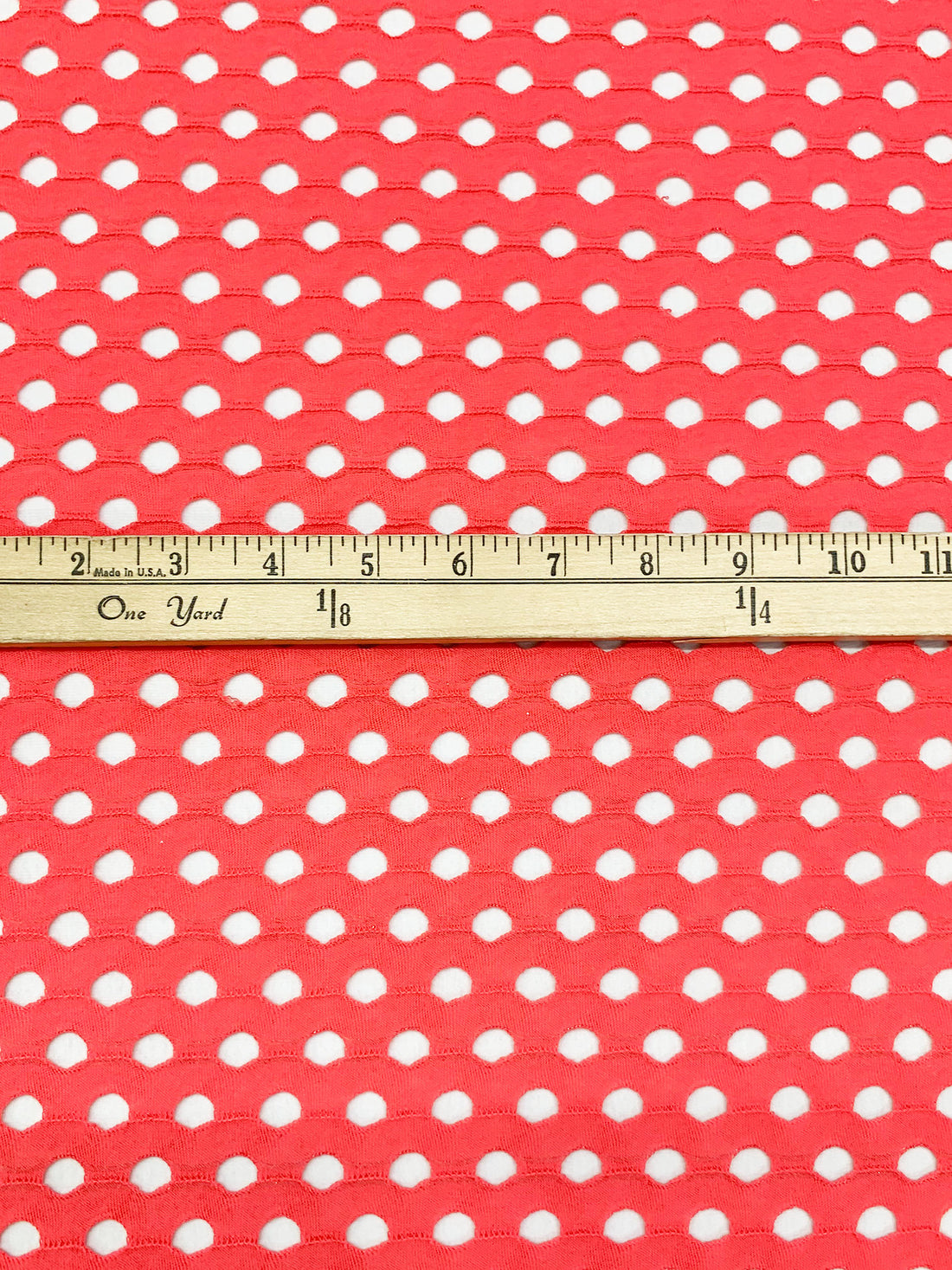 Coral Pink Polyester/Lycra Eyelet Knit 53W