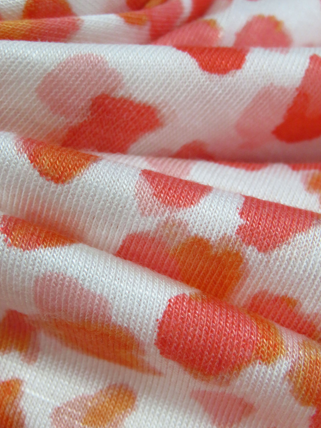 White/Light Carmine Pink/Washed-Out Persimmon/Multi Rayon/Lycra Abstract Watercolor Dot Print Jersey Knit 68W