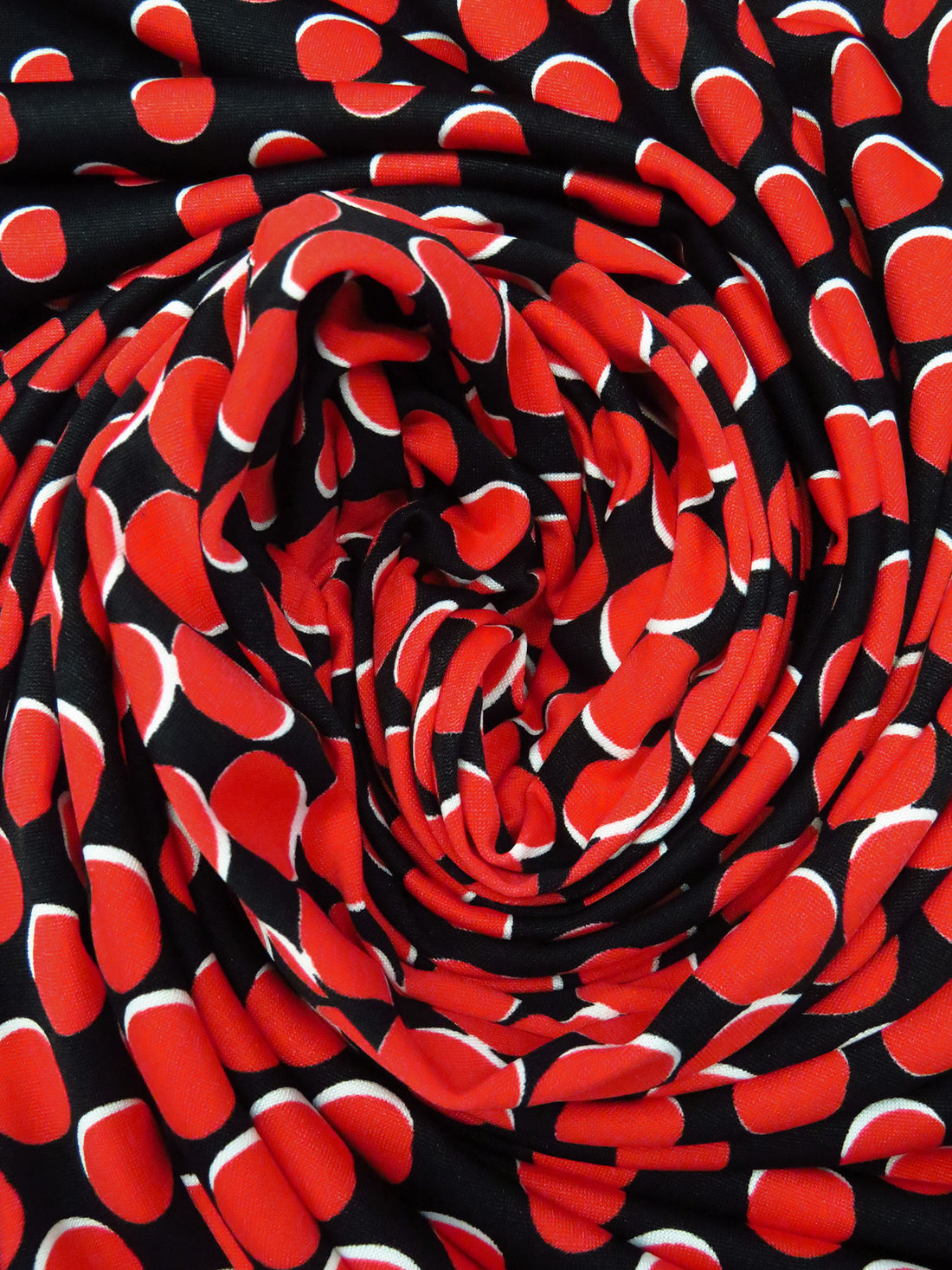 Black/White/Vivaldi Red Polyester/Lycra Variegated Offset Circles Print DTY Knit 60W