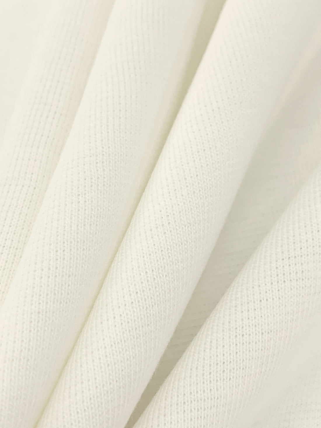 Pale Ivory 100% Cotton Interlock Knit 54W
