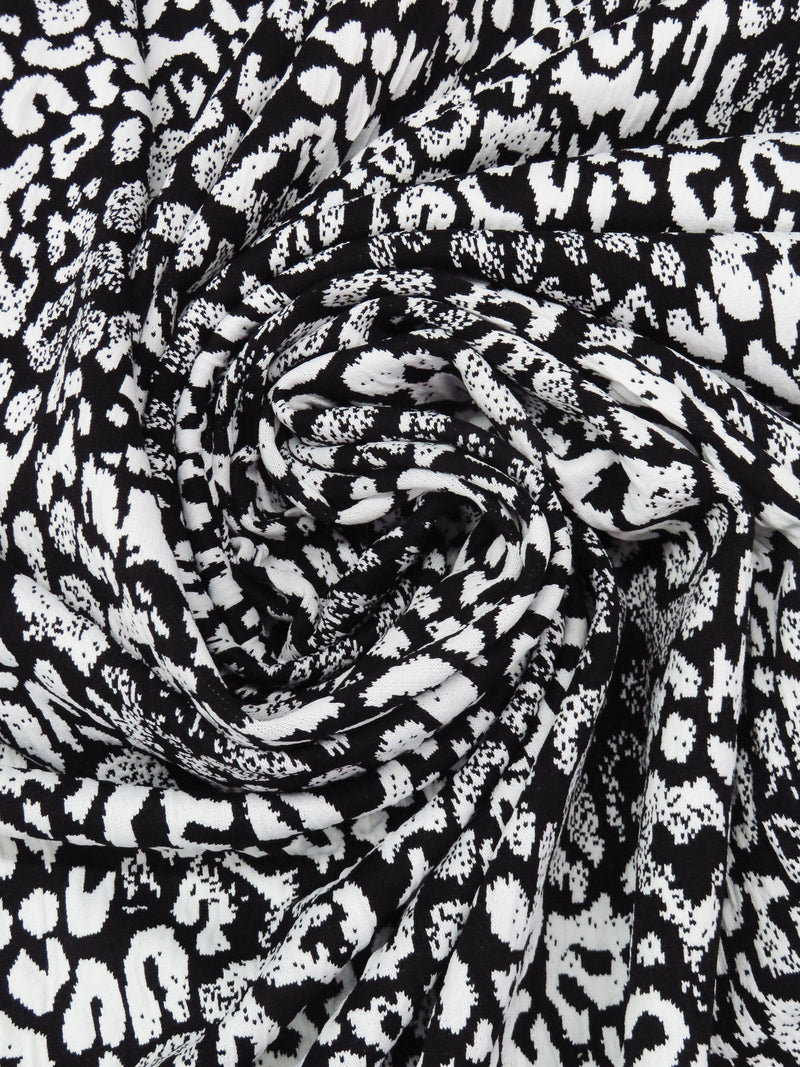 Black/White Polyester/Lycra Animal Jacquard Double Knit - Famous Dress Designer - 54W