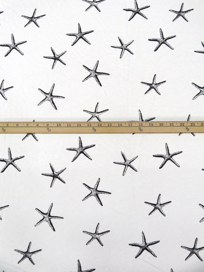 Warm White/Black 100% Cotton Starfish Print Jersey Knit 64W
