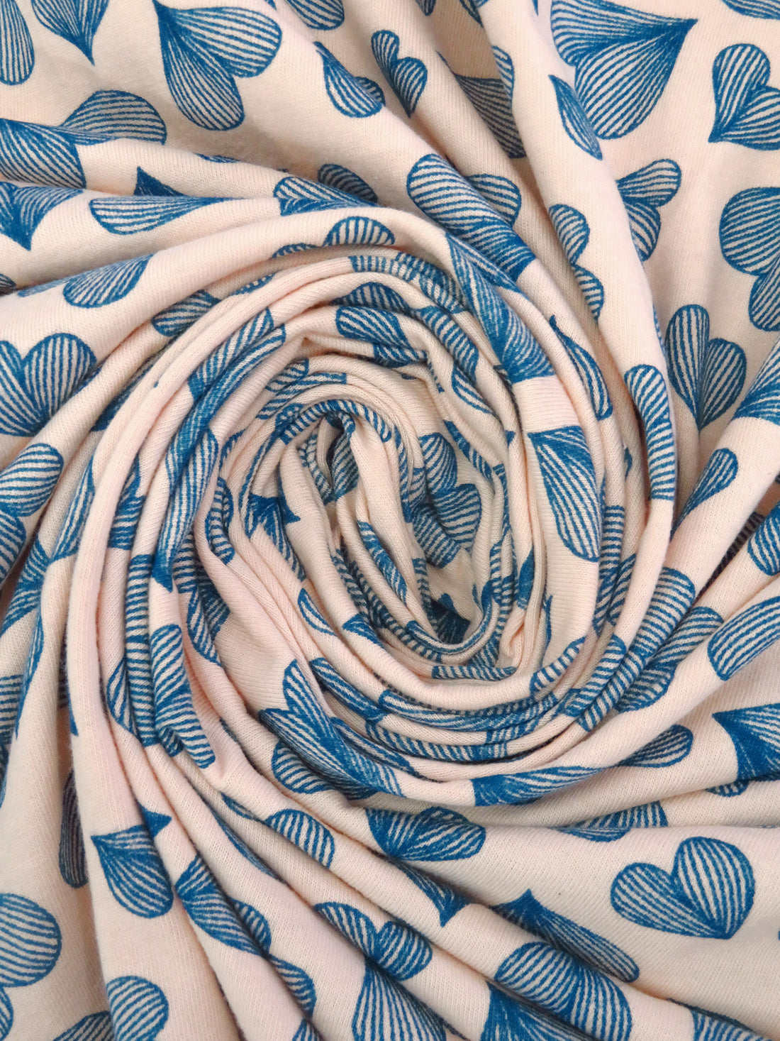 Champagne Pink/Dark Cetacean Blue 100% Cotton Hearts Print Jersey Knit 56W