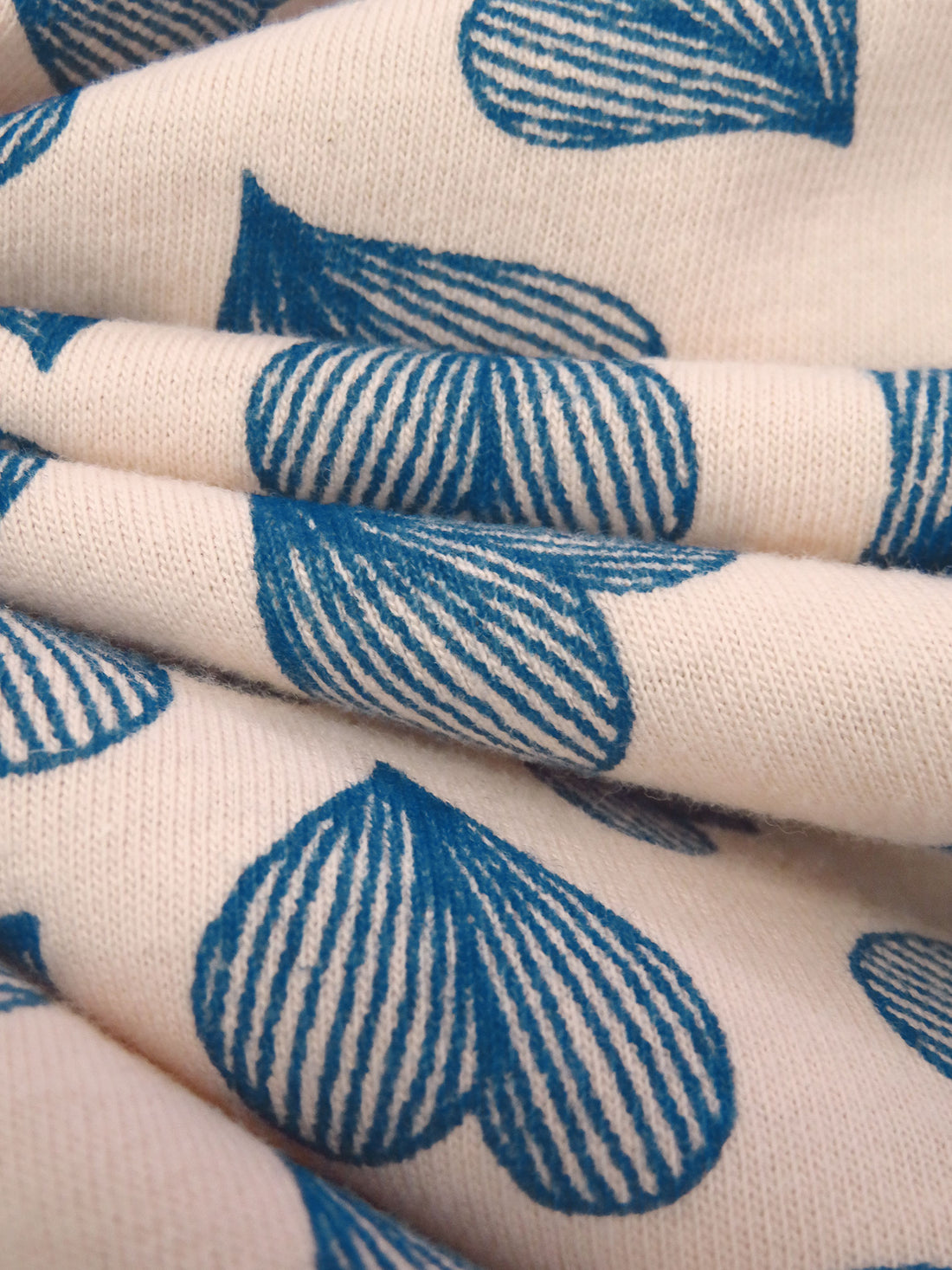Champagne Pink/Dark Cetacean Blue 100% Cotton Hearts Print Jersey Knit 56W