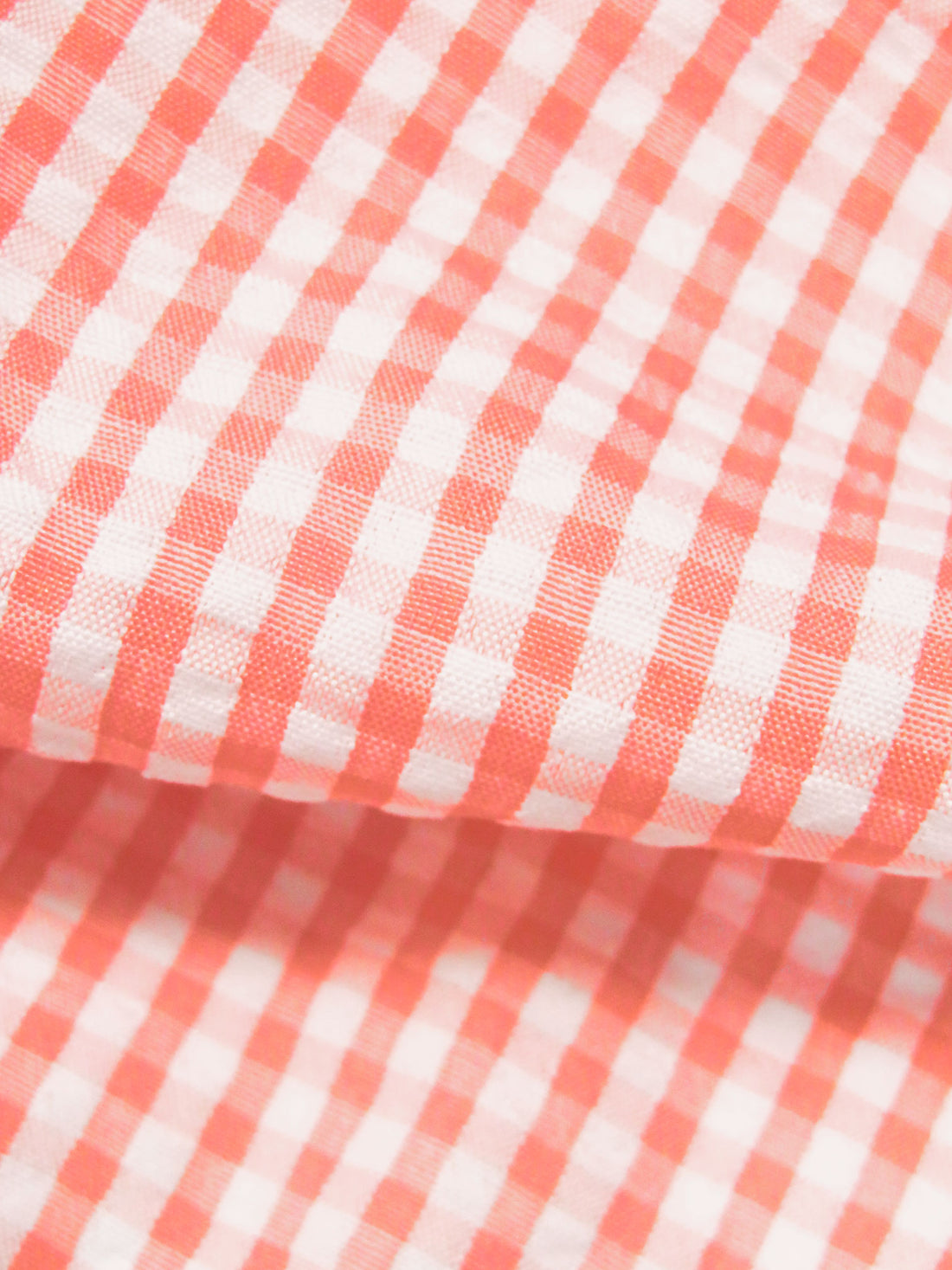 Peachy Pink/White 100% Polyester Gingham Weave Seersucker Shirt Weight Woven 57W