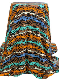 Coyote Brown/Tangerine/Cyan Azure/Multi 100% Rayon Horizontal Stylized Animal Print Challis 57W