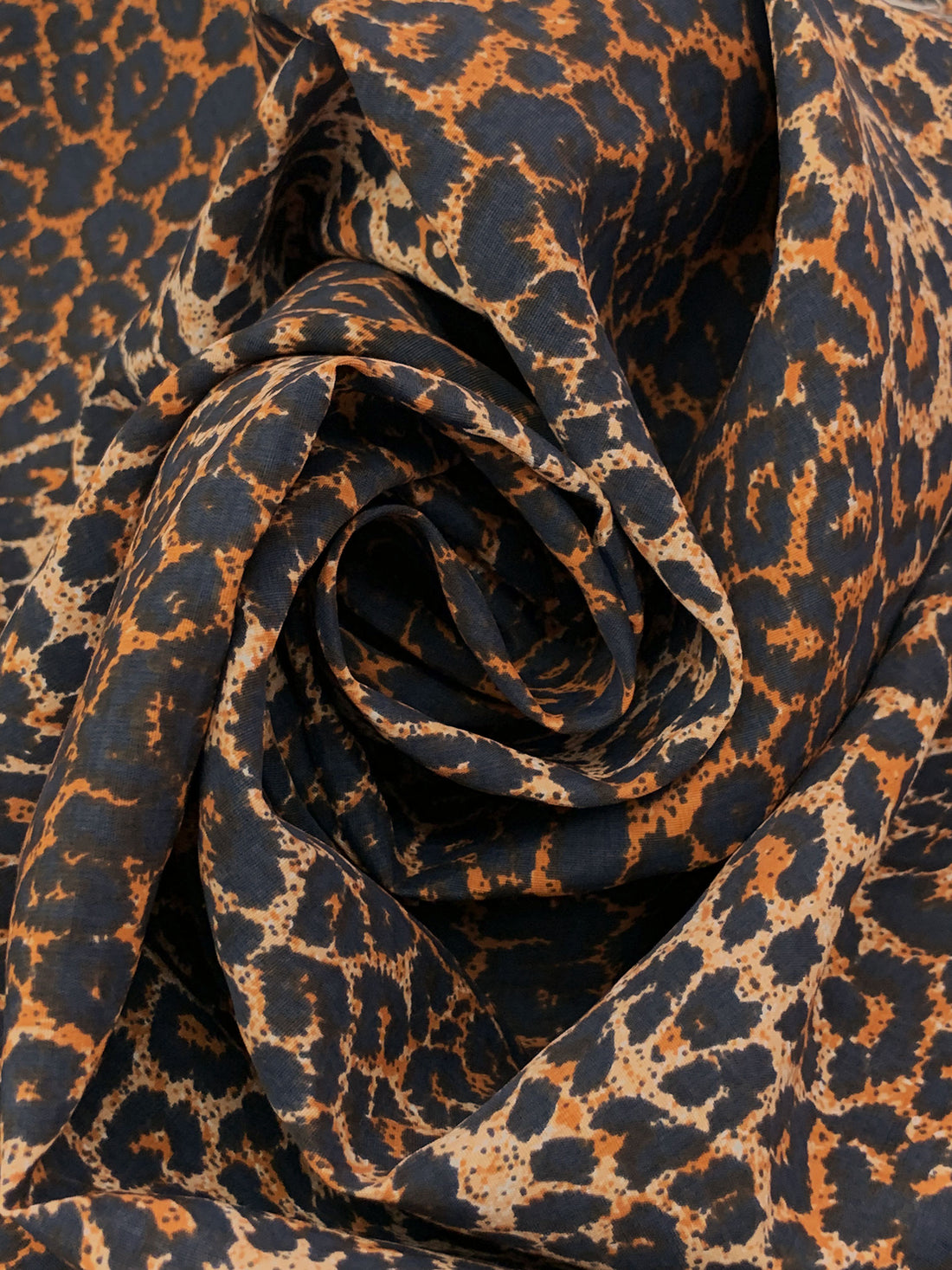 Raw Sienna/Apricot/Black 100% Rayon Animal Print Poplin 56W