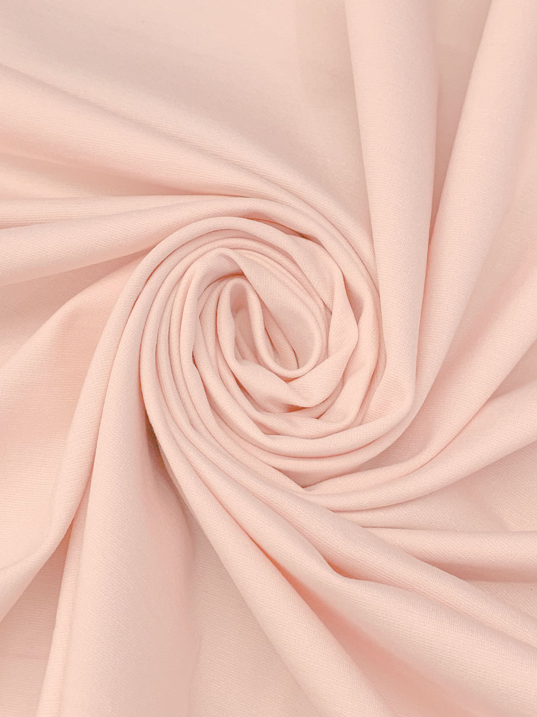 Champagne Pink Rayon/Nylon/Lycra Ponte Knit 56W