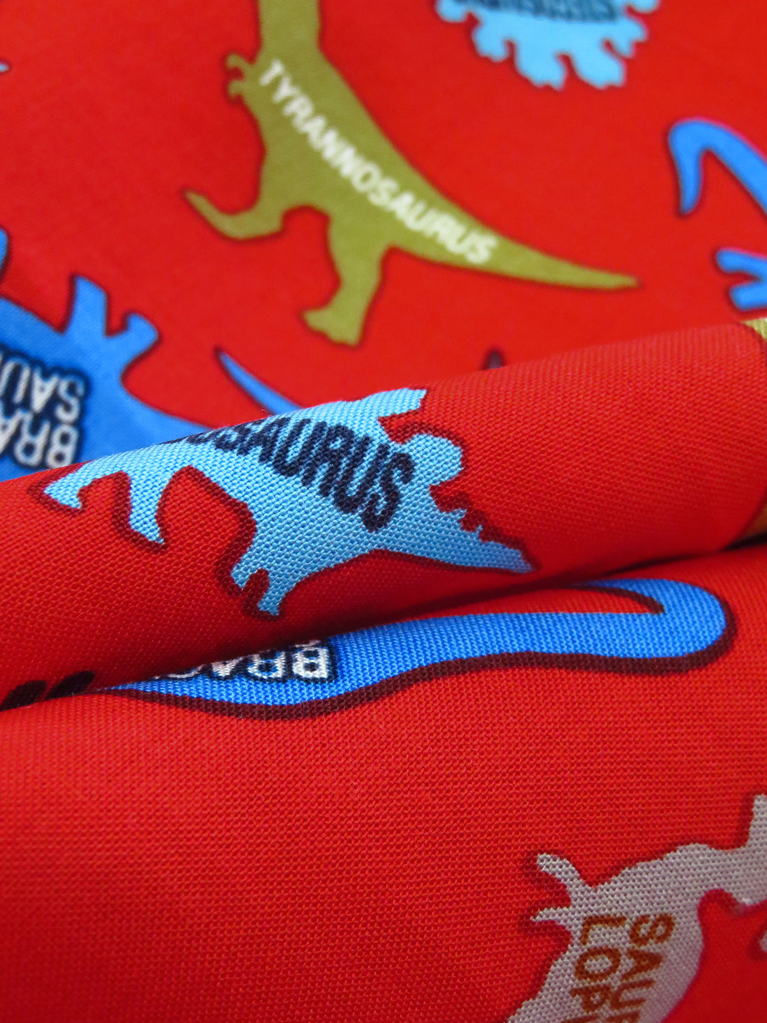 Chili Red/Lemon/Button Blue/Multi 100% Rayon Labeled Dinosaur Print Challis - NY Designer - 43W