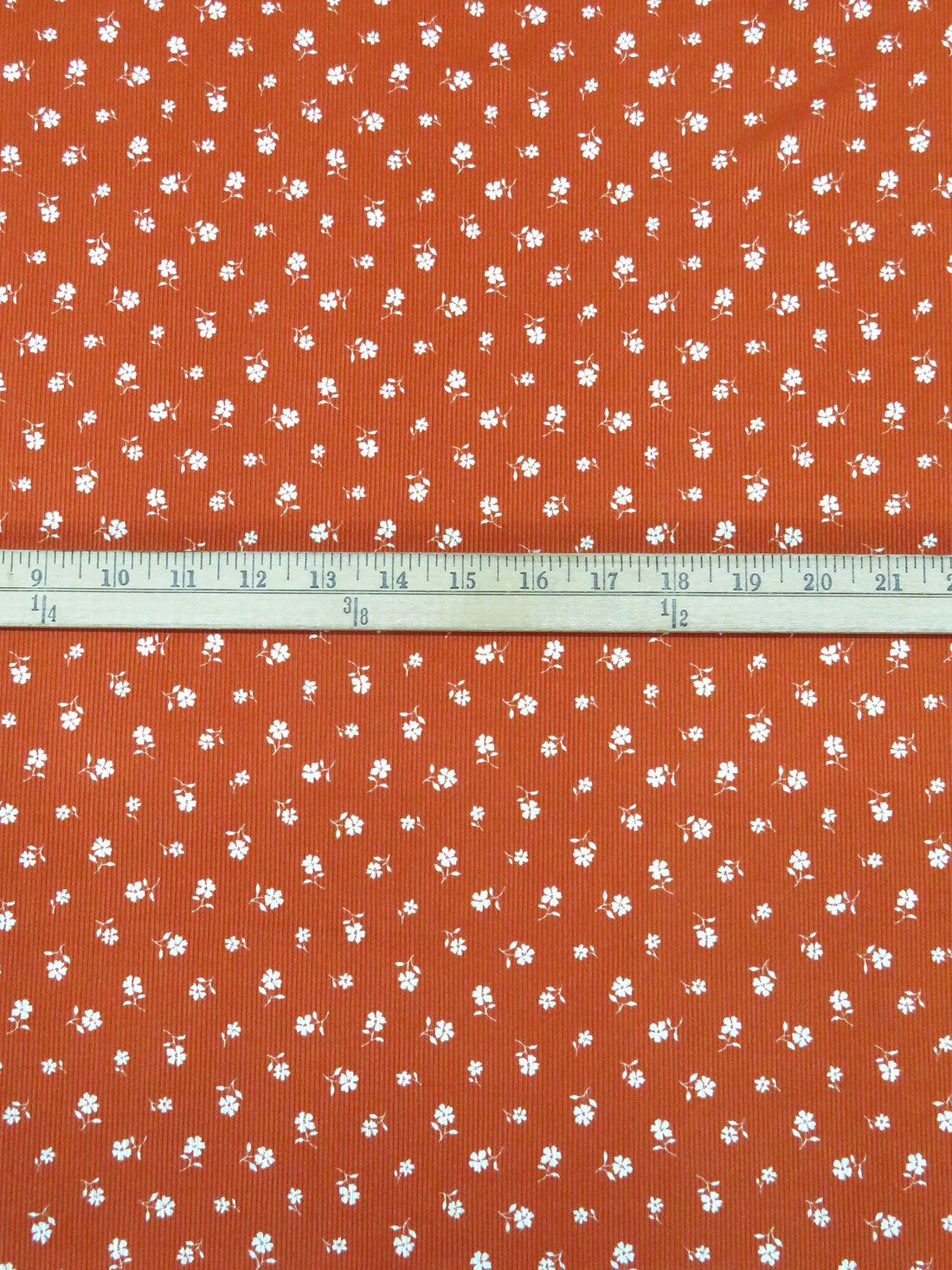Muted Rust/White Polyester/Lycra Small Floral Print Double Brushed Rib Knit 58W