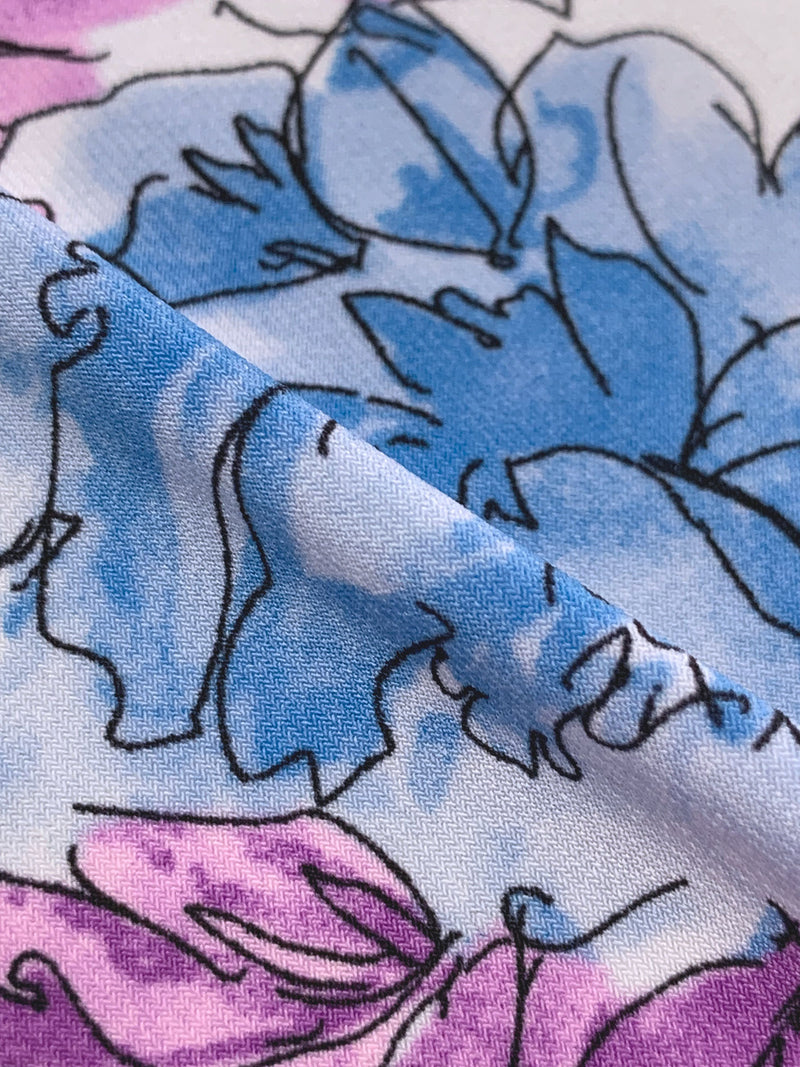 SOLD BY THE PANEL ONLY - Columbia Blue/Deep Lilac/Splash Blue/Black Polyester/Lycra Horizontal Sketch Floral Print ITY Knit 56W