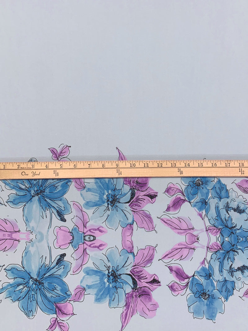 SOLD BY THE PANEL ONLY - Columbia Blue/Deep Lilac/Splash Blue/Black Polyester/Lycra Horizontal Sketch Floral Print ITY Knit 56W