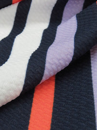 SOLD AS IS ONLY - White/Navy/Periwinkle/Safety Orange Polyester/Lycra Vertical Stripe Print Liverpool Double Knit 56W