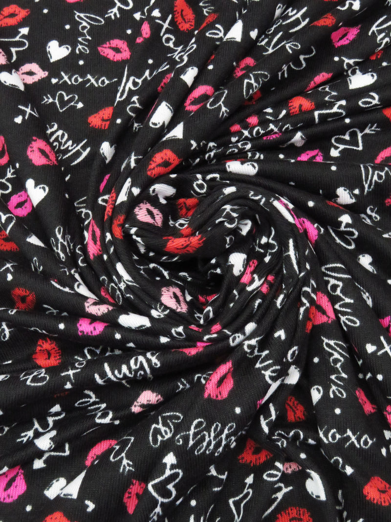 Black/White/Hot Fuchsia/Crimson Polyester/Lycra Hugs And Kisses Print Brushed Sweater Knit 54W