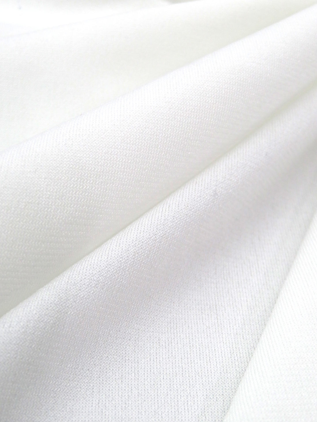 Eggshell White Polyester/Lycra ITY Knit - Made In Korea - 56W