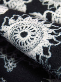 Ink Black/White Polyester/Lycra Crochet Floral Dollie Print Jersey Knit 58W