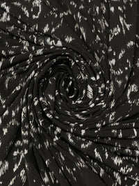 Black/Off-White Polyester/Lycra Abstract Print ITY Knit 59W
