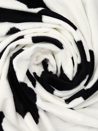 Black/Off-White 100% Polyester Cow Print On Vertical Wave Weave Faux Fur - NY Designer - 60W