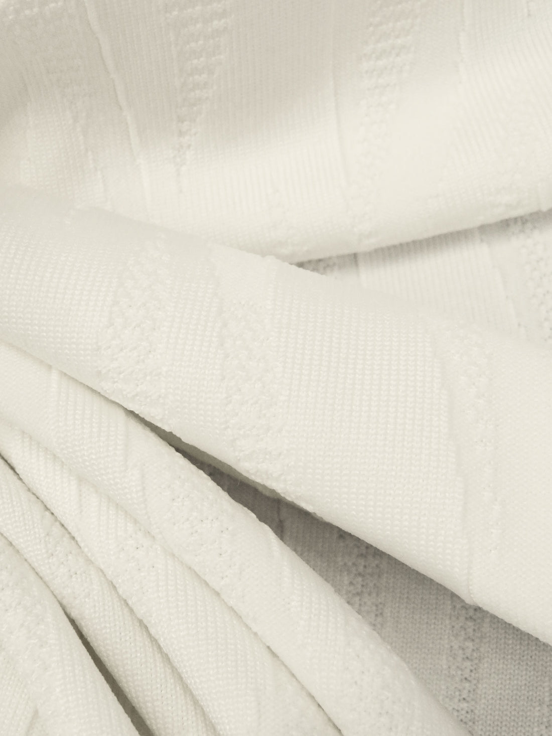 Warm White Polyester/Lycra Abstract Animal Weave Jacquard Double Knit 60W